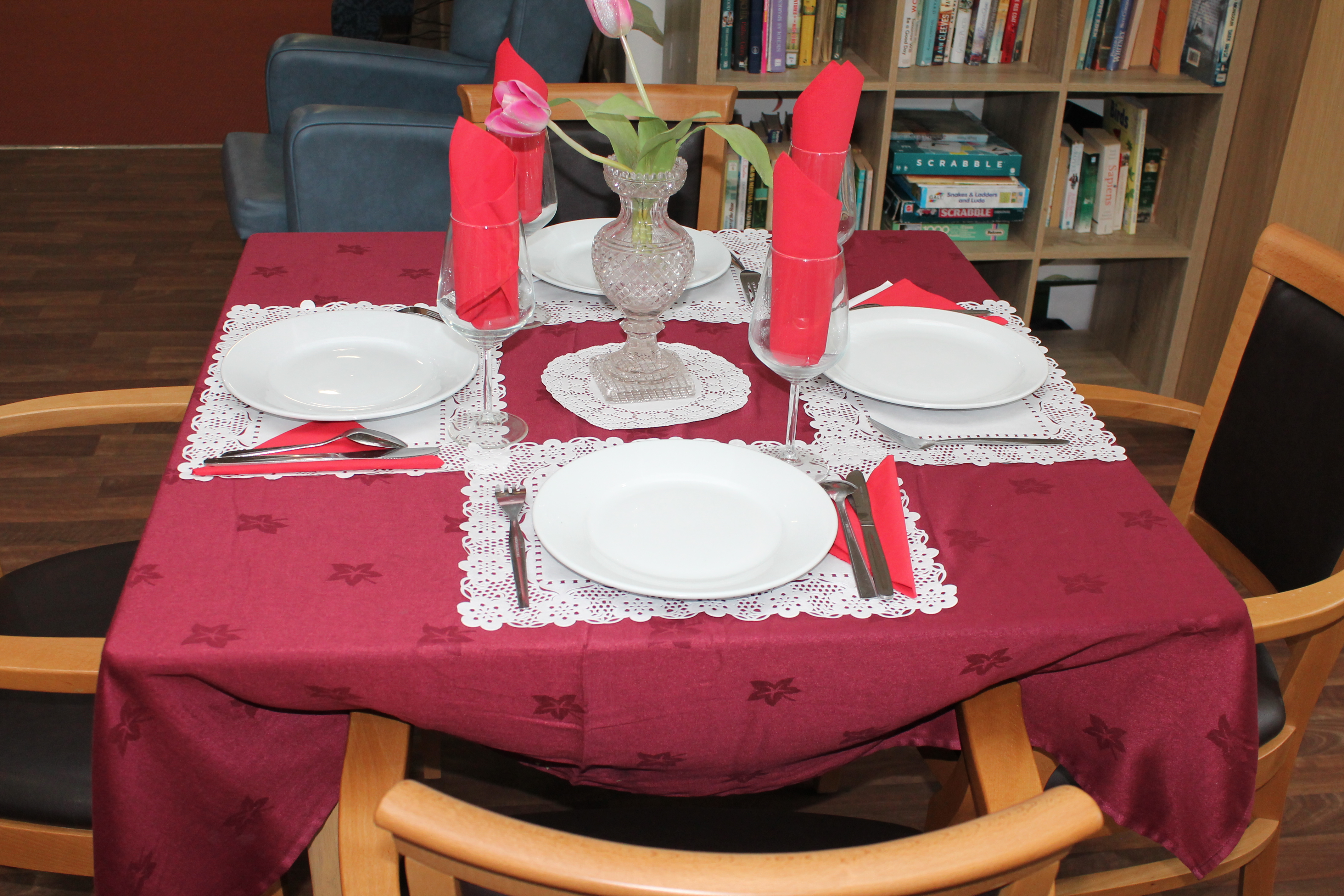 Beautifully set dining tables with fresh food